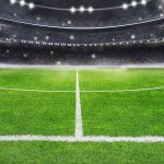Visione del campo di calcio da centrocampo